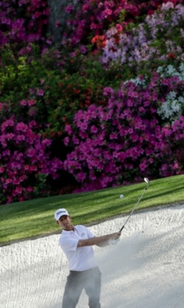 The Latest: Spieth begins 2nd round at Masters with lead